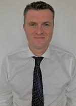 Headshot photo of Christian Evans ACCA CPFA